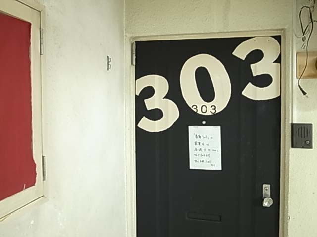 9.休業303ドア.jpg